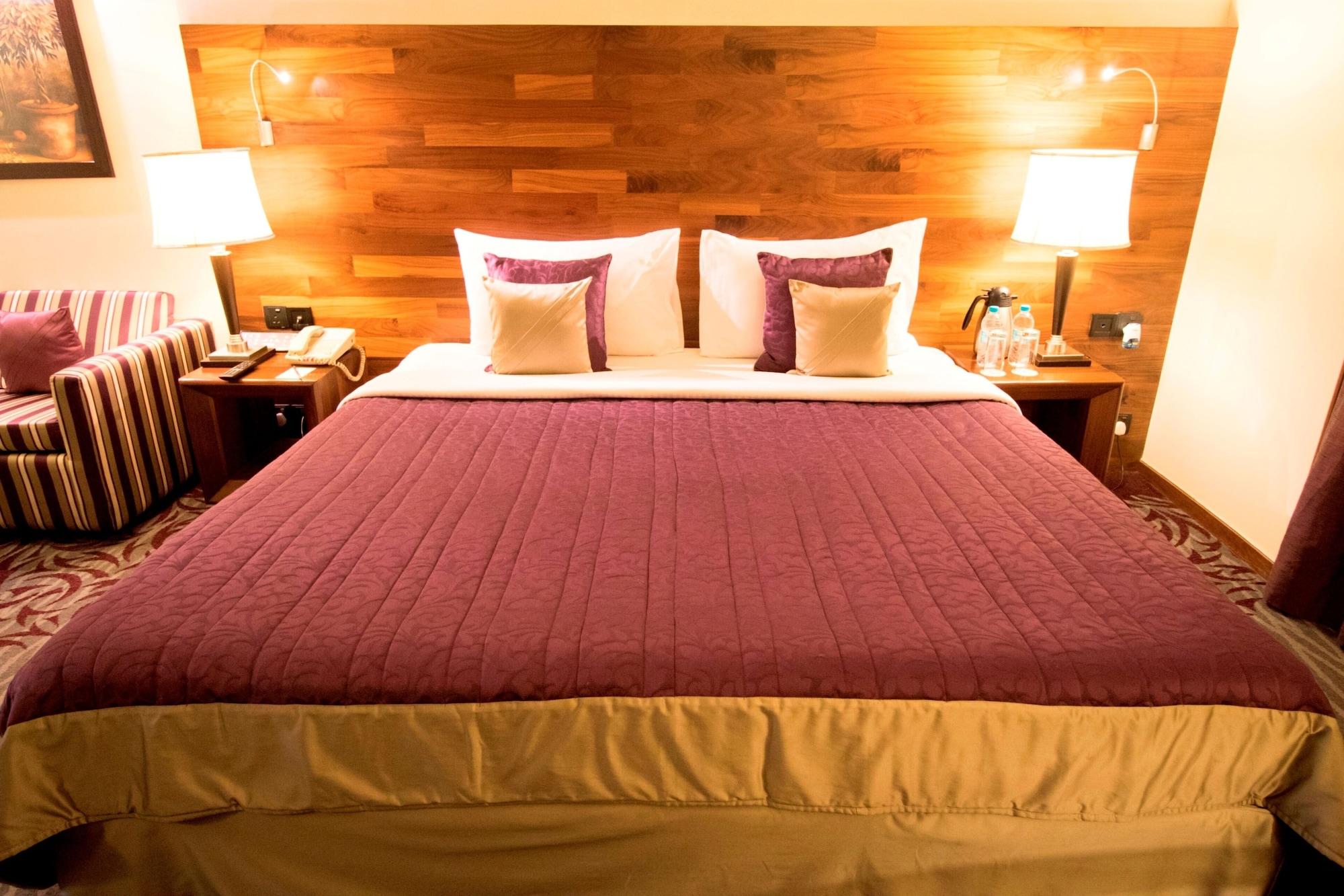 The Orchid Hotel Hinjewadi Pune Extérieur photo A bed